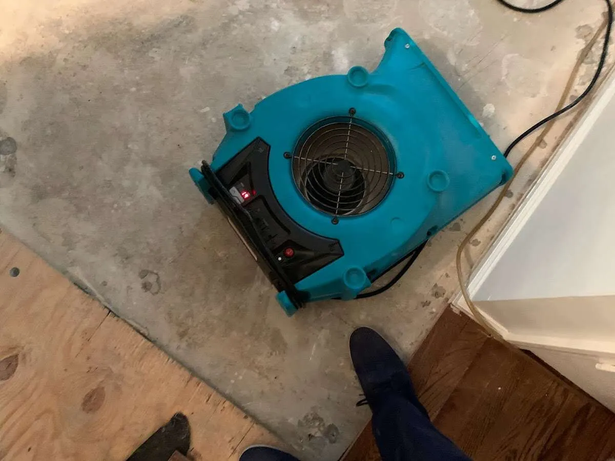 Air mover drying subfloor during Leak Detection & Repair in Short Pump